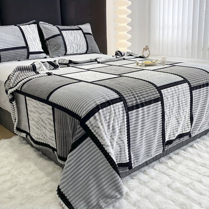 Blødt fløjlstæppe til sofa eller seng. Lækkert, varmt plaid i høj kvalitet til hygge og indretning.