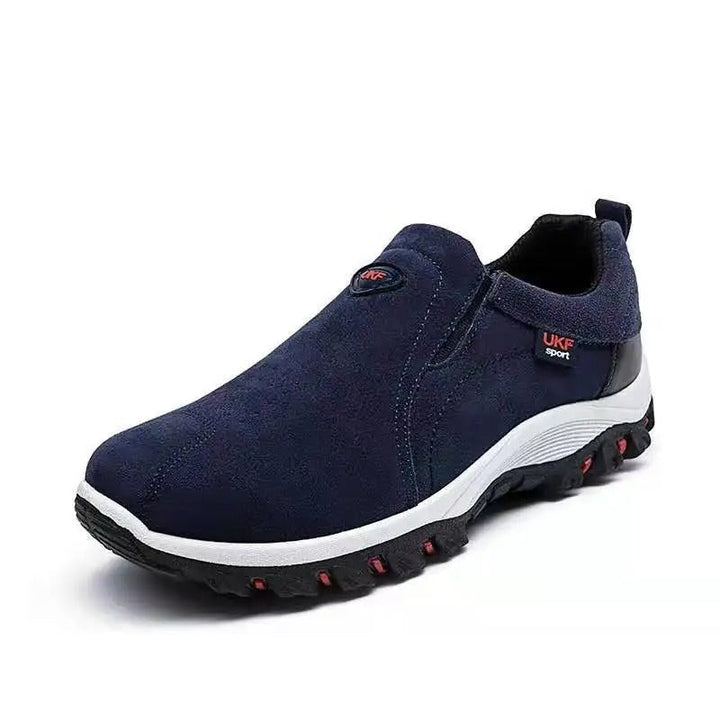 Fleksible slip-on herresko i grå. Materiale der tilpasser sig foden for optimal komfort.
