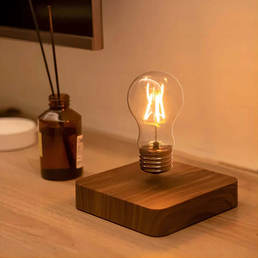 Svævende LED-lampe med valnøddetræsfod