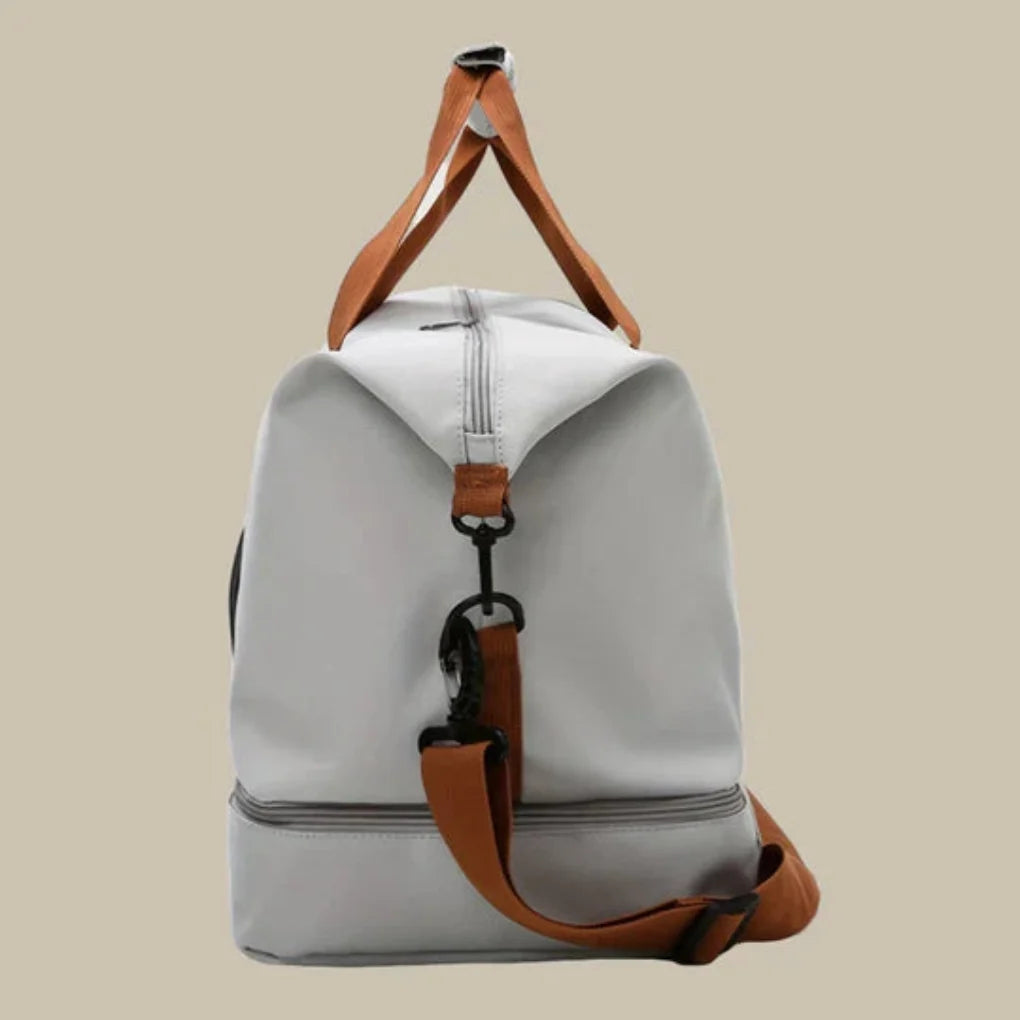 Stilfuld, rummelig duffel taske i oxford stof til mænd. Perfekt som rejsetaske.