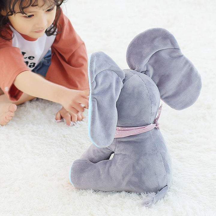 Detaljeret blå elefant bamse med syngende funktion og bevægelige ører. Perfekt børnegave.
