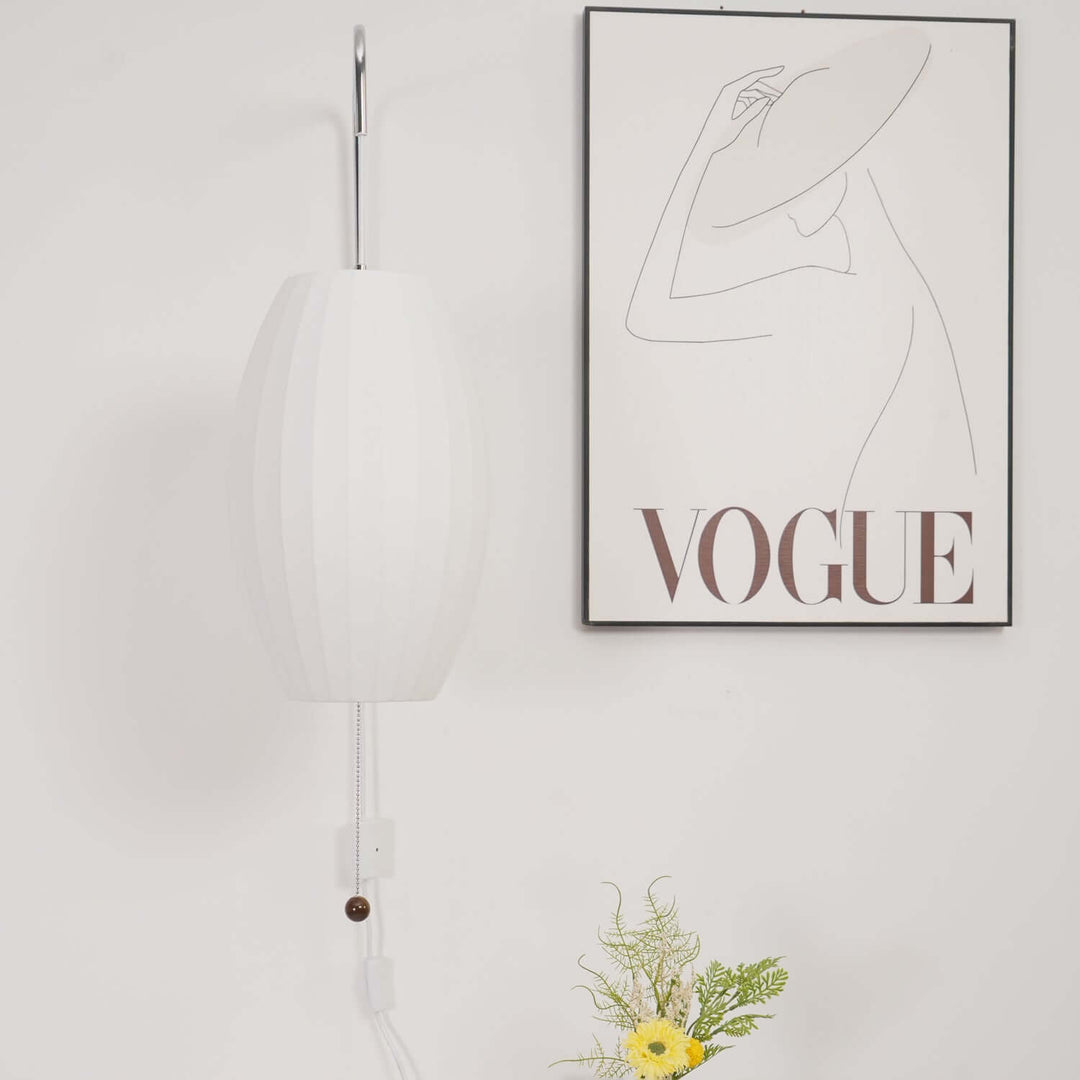 Moderne væglampe med kugledesign og varmt hvidt lys