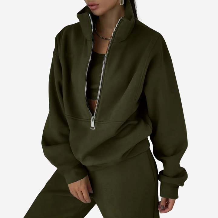Blødt og behageligt damesæt i to dele af polyester. Ideel til en afslappet, moderne stil.