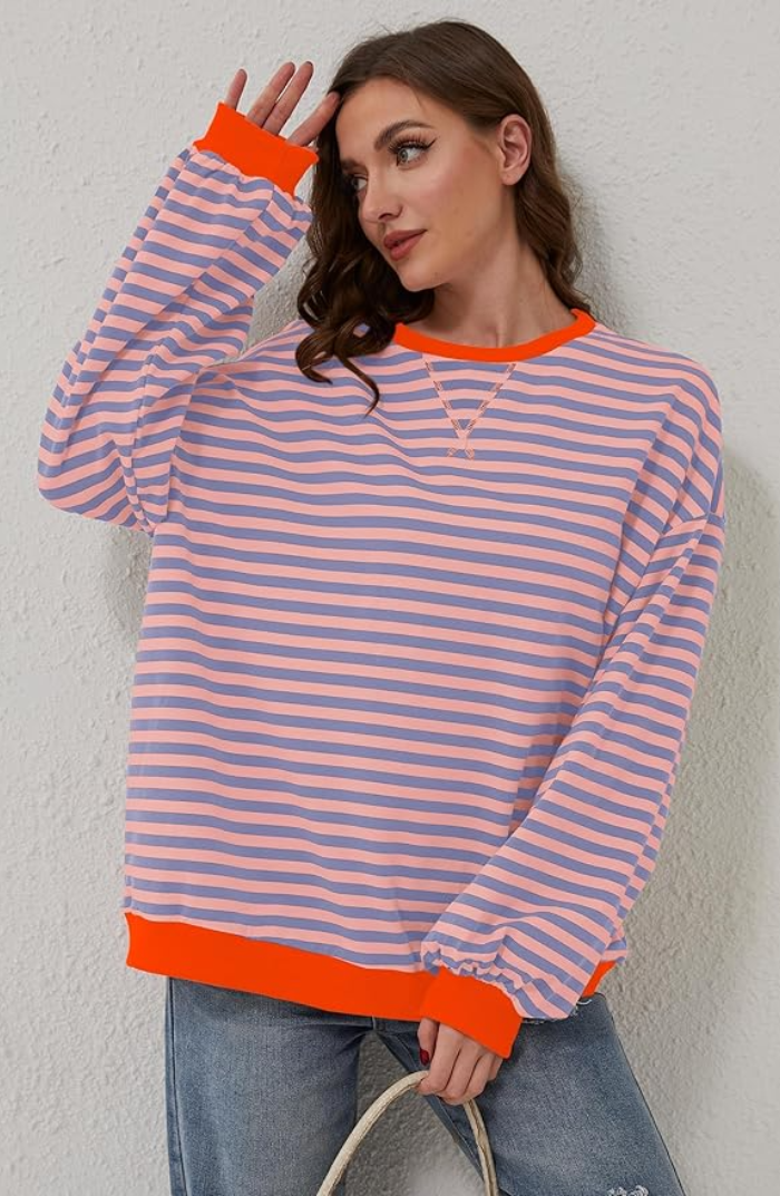Blød og komfortabel dame sweater til foråret. Afslappet pasform, perfekt for modebevidste.