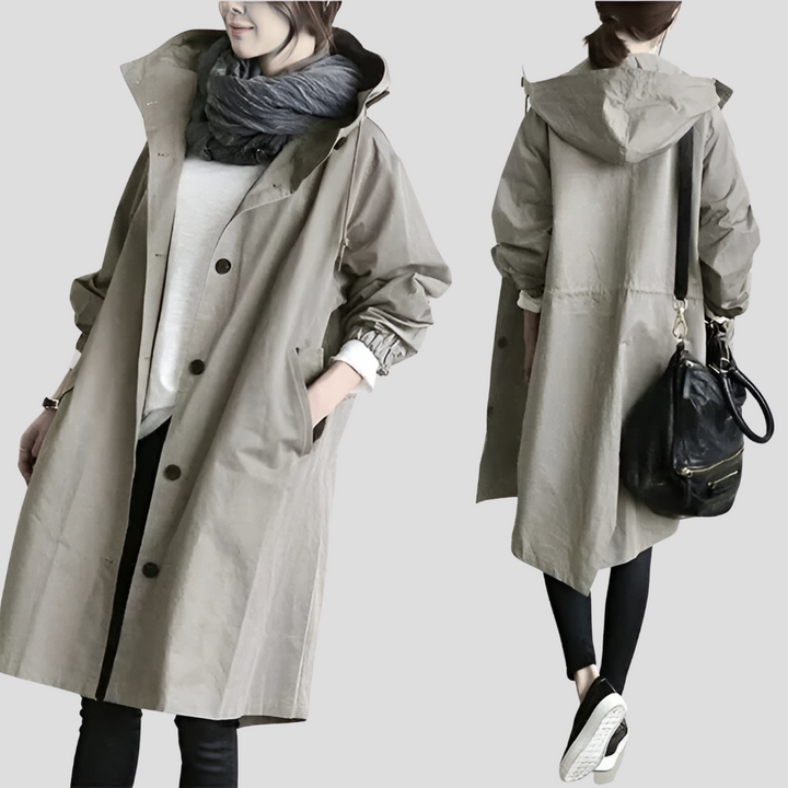 Stilfuld dame vandtæt oversized mellemlang trenchcoat, perfekt til forårs- og efterårsmode.