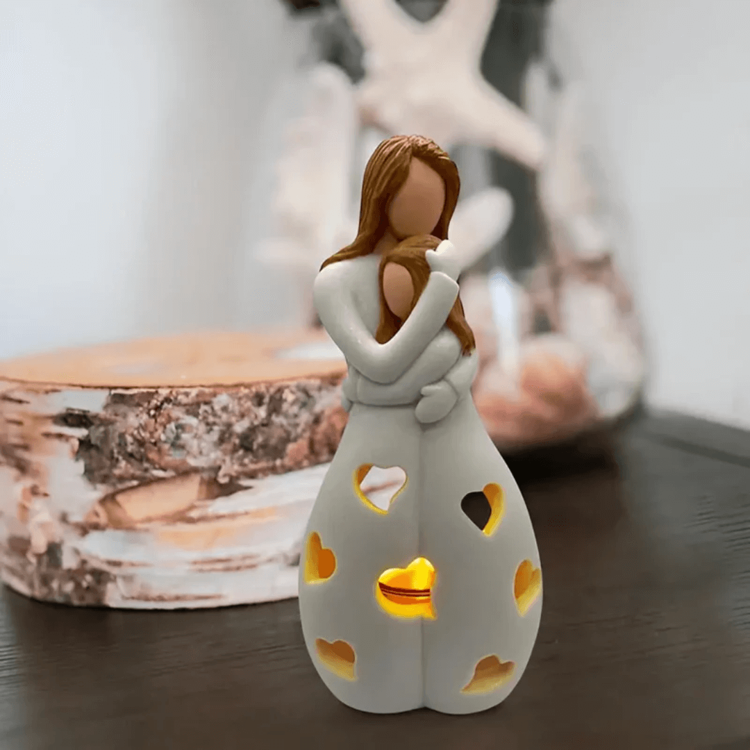 Mor og datter lysestage skulptur