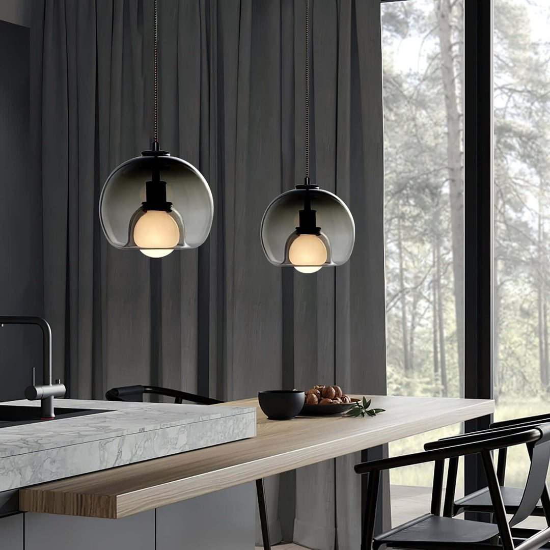 Moderne pendellampe i metal og glas