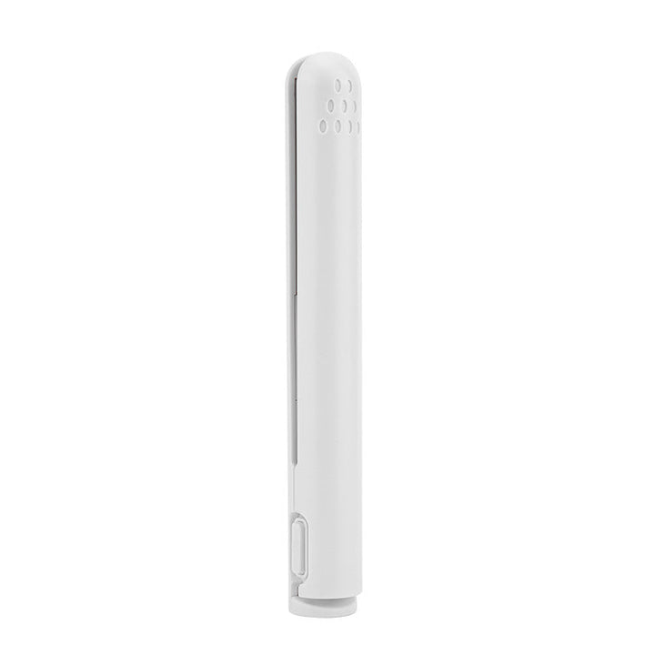 2-i-1 hårstyler i brug, ergonomisk design, klar til at skabe fleksible frisurer.
