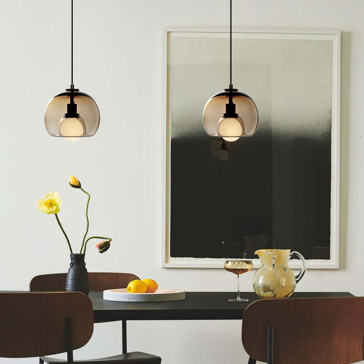 Moderne pendellampe i metal og glas