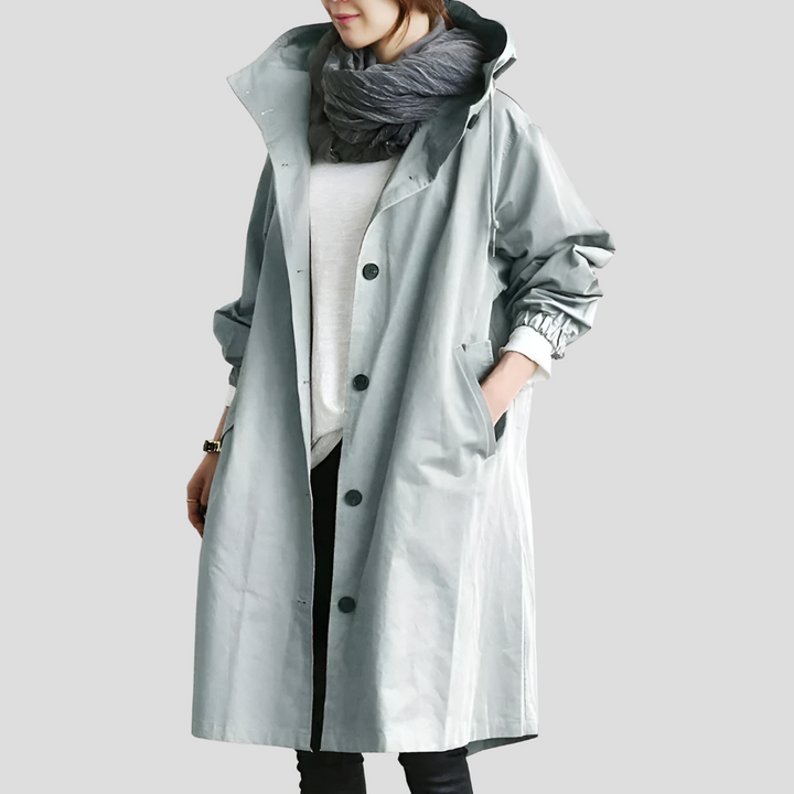 Komfortabel kvindefrakke: vandtæt, oversized og mellemlang trenchcoat i moderne stil.