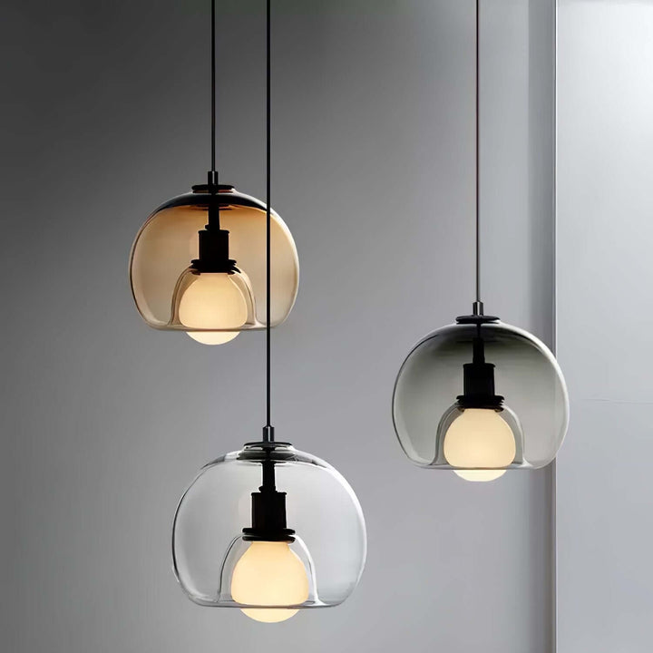Moderne pendellampe i metal og glas