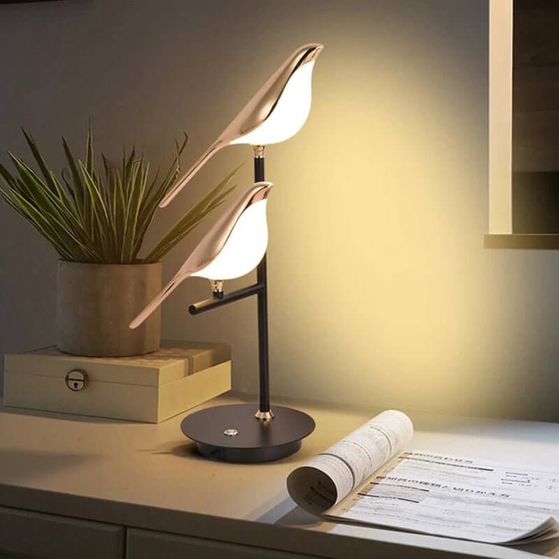 Moderne LED-bordlampe med fugledesign