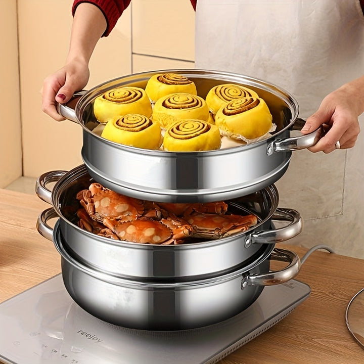 3-lags dampkoger i rustfrit stål, sidevisning med elegant rustfri overflade og 3 stablede niveauer.
