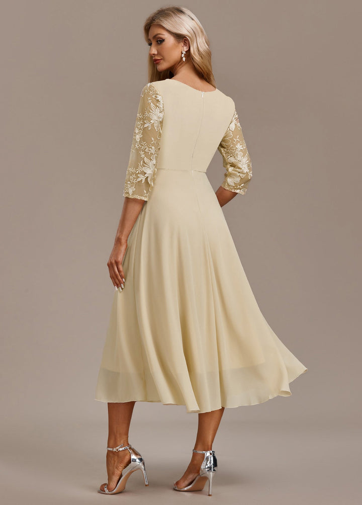 Elegant champagne midi festkjole til kvinder. Ideel som cocktailkjole & aftenkjole.