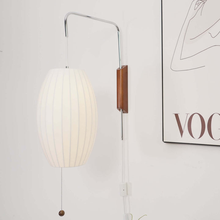 Moderne væglampe med kugledesign og varmt hvidt lys