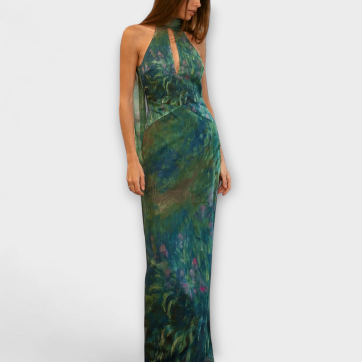 Flot kvinders selskabskjole med unikt Monet Iris print. Lang elegant maxi kjole til særlige lejligheder.