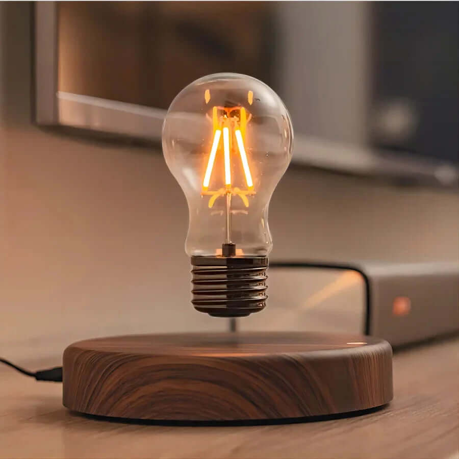 Svævende LED-lampe med valnøddetræsfod