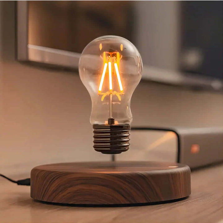 Svævende LED-lampe med valnøddetræsfod