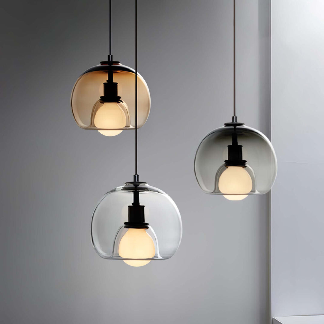 Moderne pendellampe i metal og glas