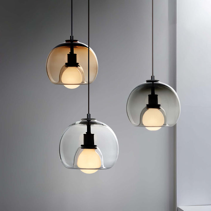 Moderne pendellampe i metal og glas