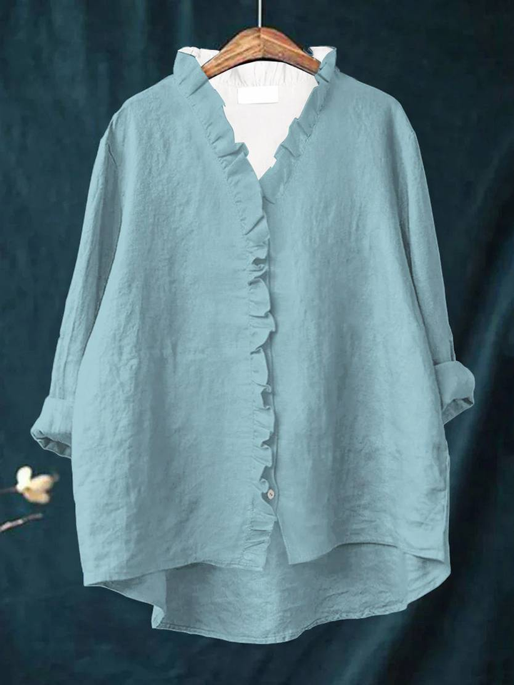 Komfortabel dame flæsebluse med lange ærmer. Elegant og feminin skjorte, ideel til en stilfuld hverdag.
