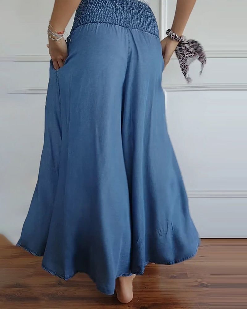 Kvindebukser med bred pasform og høj elastisk talje. Moderne boho stil med vide ben for maksimal komfort.