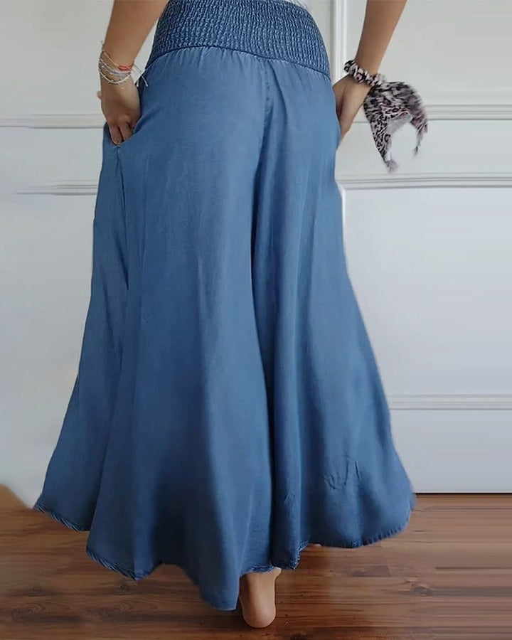 Kvindebukser med bred pasform og høj elastisk talje. Moderne boho stil med vide ben for maksimal komfort.