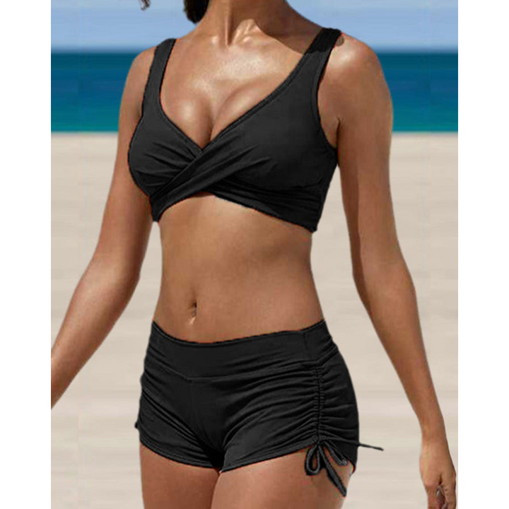 Stilfuld kvinders todelt bikini med mavekontrol og højtaljet bund, perfekt til sommer badetøj.