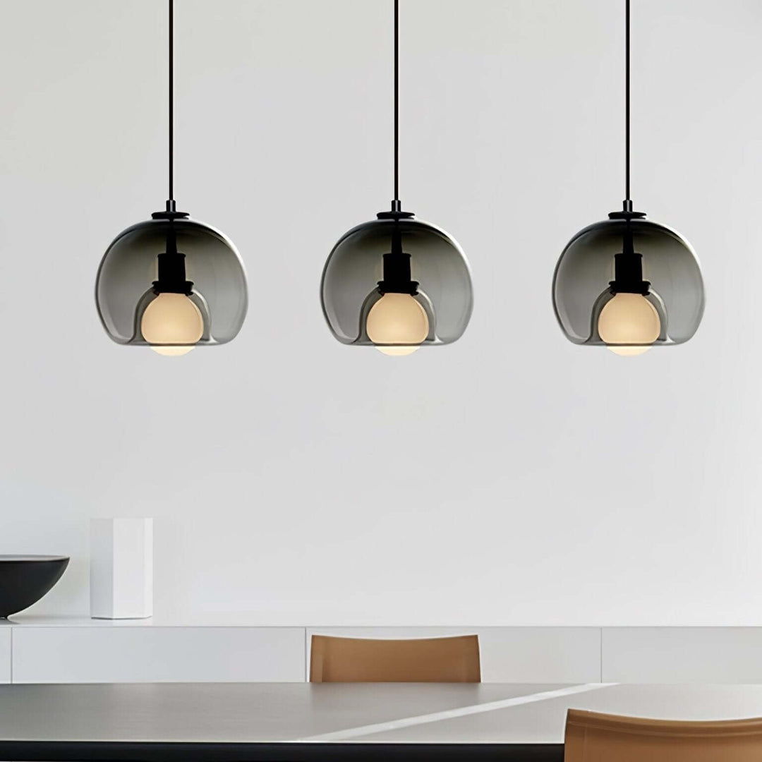 Moderne pendellampe i metal og glas