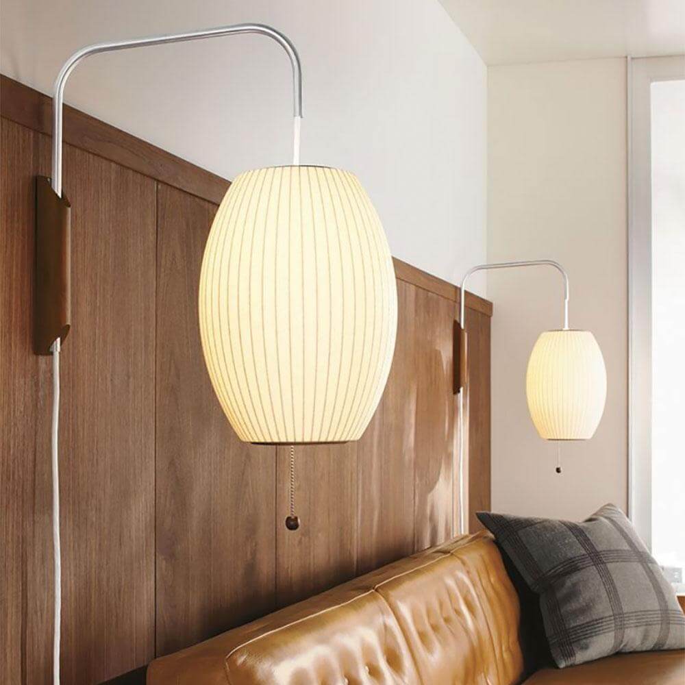 Moderne væglampe med kugledesign og varmt hvidt lys