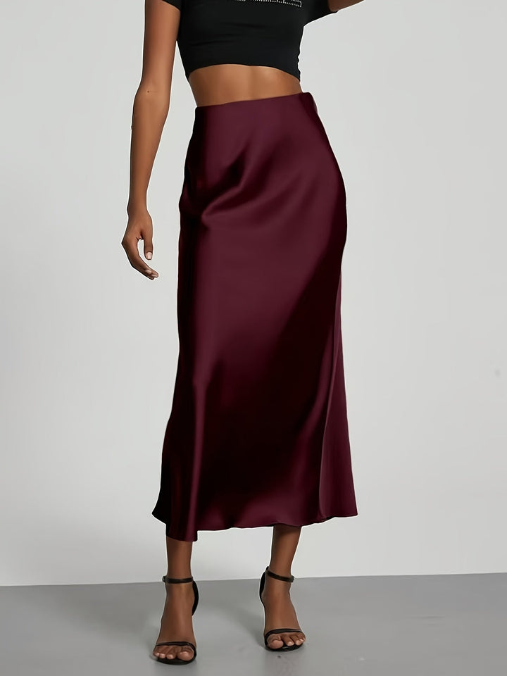 Formel maxi satinnederdel for kvinder, ideel til festlige lejligheder og et elegant look.