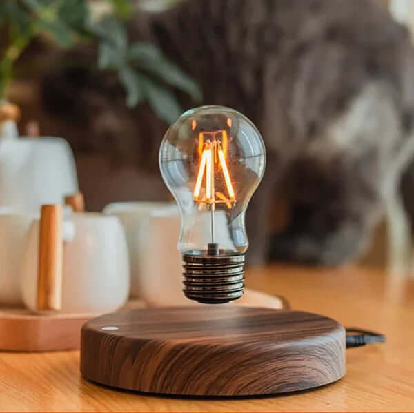 Svævende LED-lampe med valnøddetræsfod