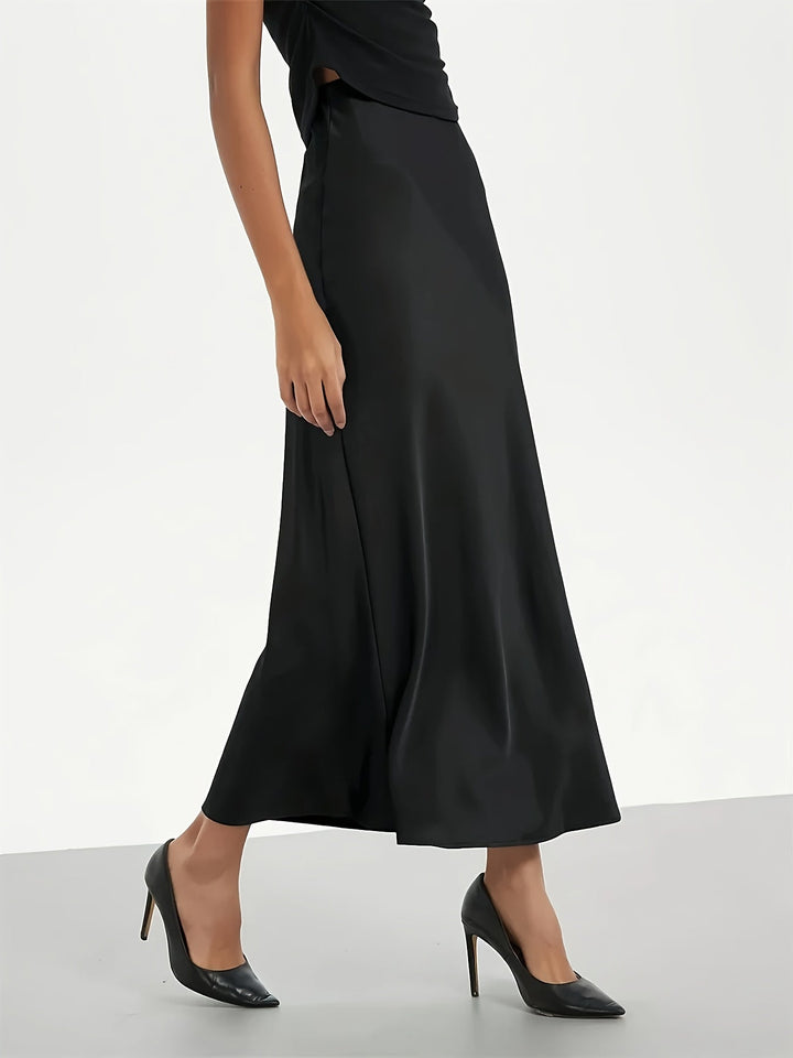 Kvinders satin maxi nederdel med høj talje, perfekt til en elegant og formel stil.