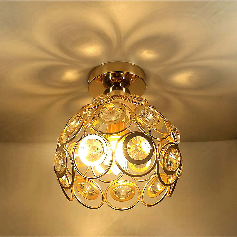 Luksuriøs kugleloftlampe i guld