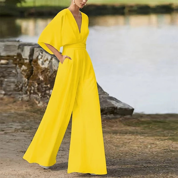 Dame jumpsuit med stilfuld V-hals og løs pasform, et alsidigt valg til casual mode.