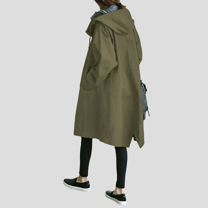 Klassisk mellemlang dame trenchcoat, oversized og vandafvisende for stil og komfort.