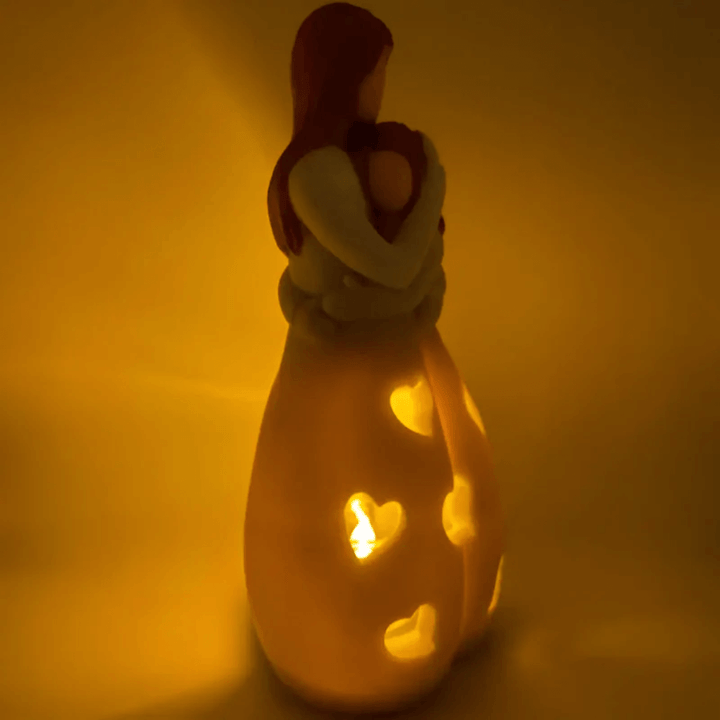 Mor og datter lysestage skulptur