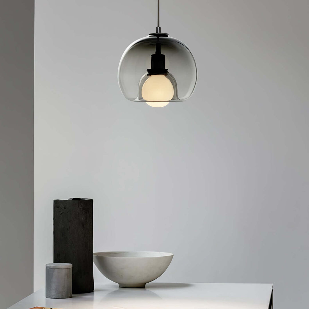 Moderne pendellampe i metal og glas