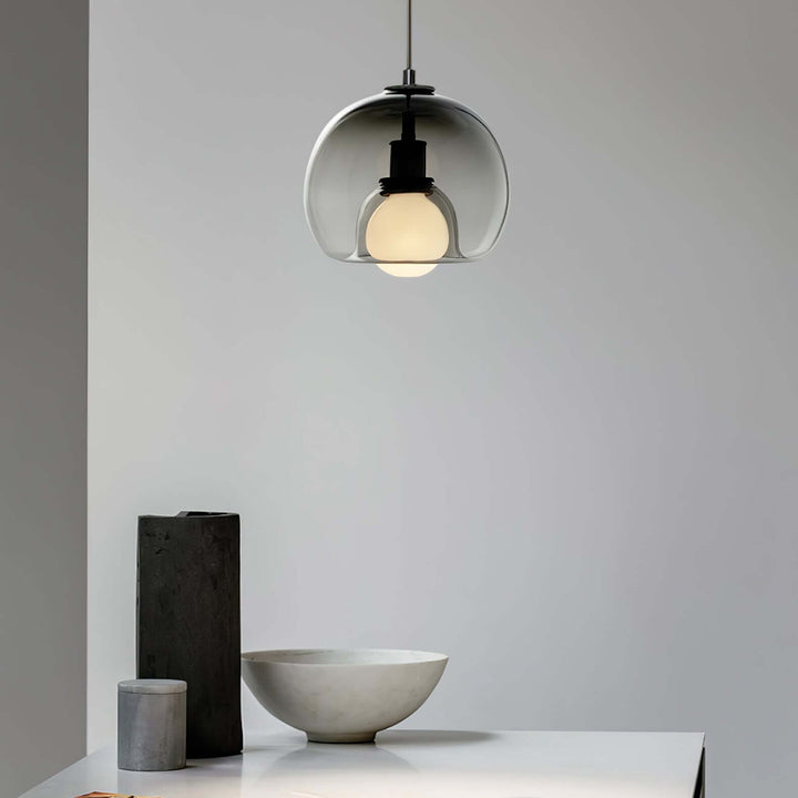 Moderne pendellampe i metal og glas