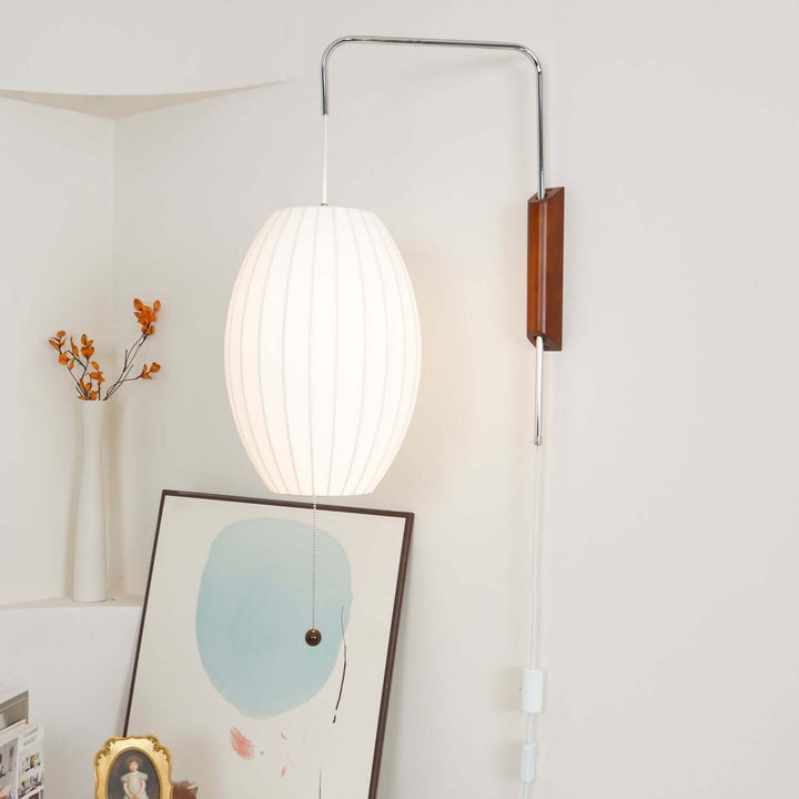 Moderne væglampe med kugledesign og varmt hvidt lys