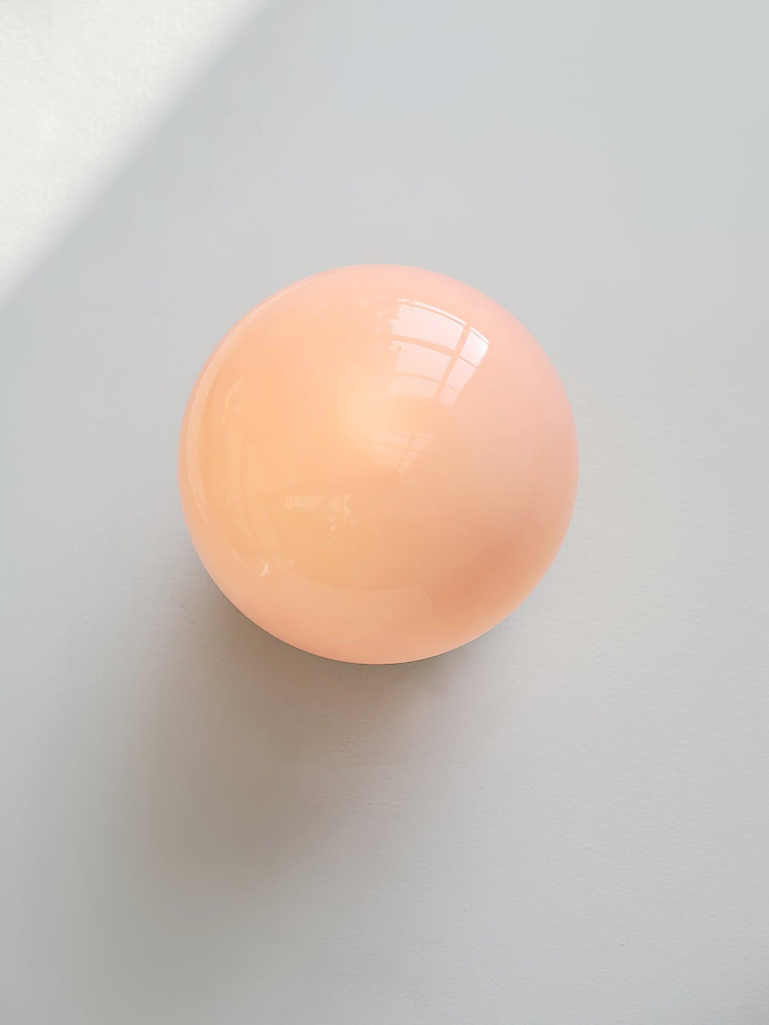 Moderne væglampe i rosa glas