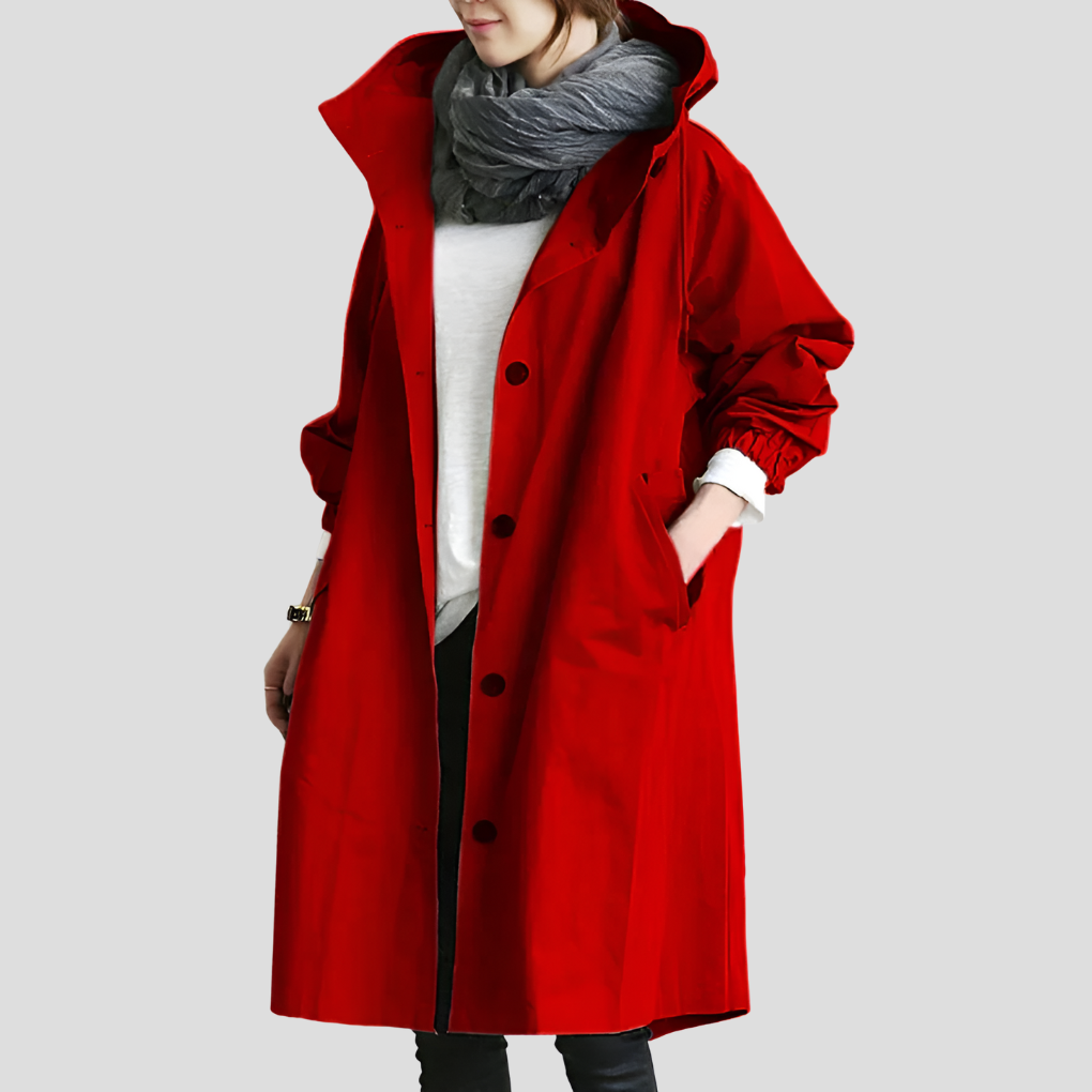 Moderne dame trenchcoat, oversized og mellemlang, i vandtæt design for et chic look.