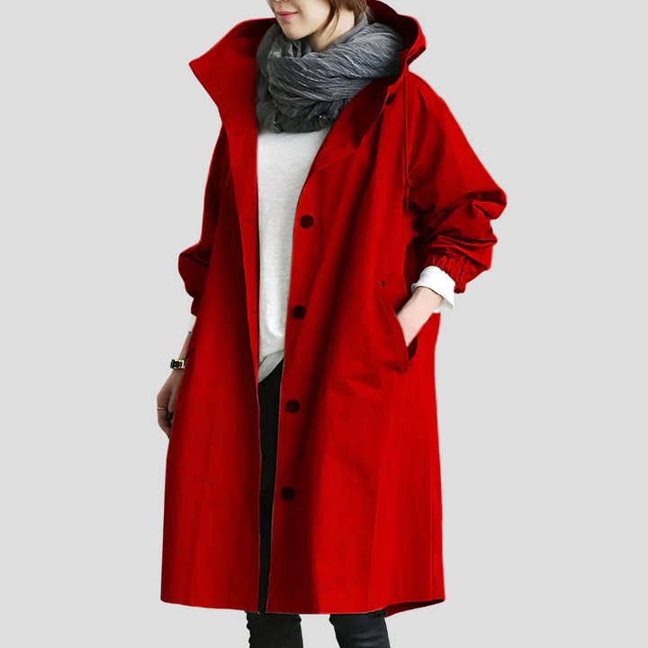 Moderne dame trenchcoat, oversized og mellemlang, i vandtæt design for et chic look.