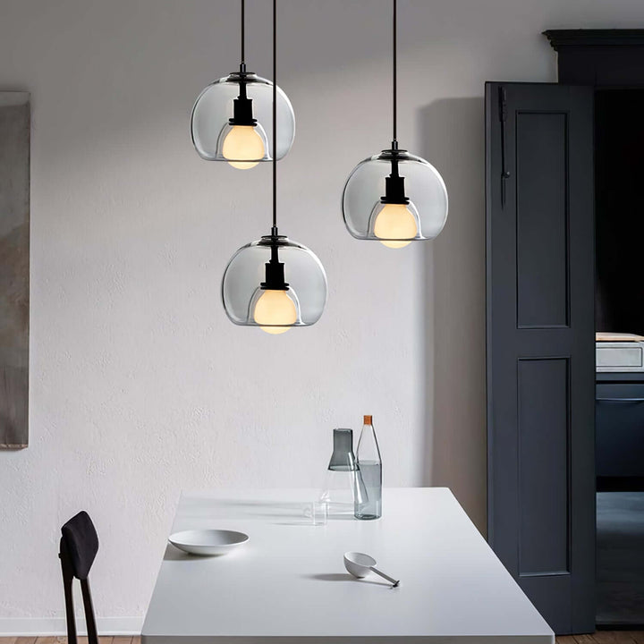 Moderne pendellampe i metal og glas