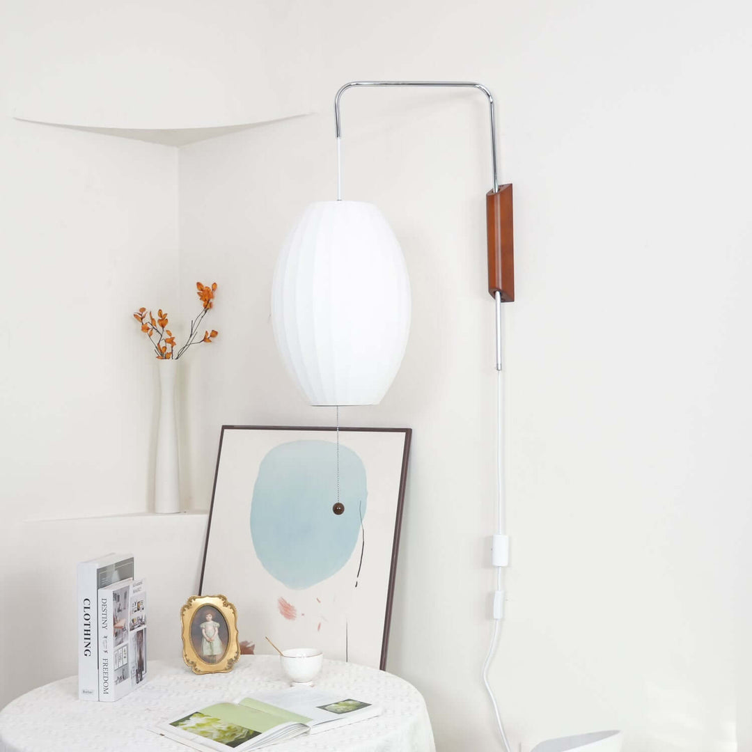 Moderne væglampe med kugledesign og varmt hvidt lys