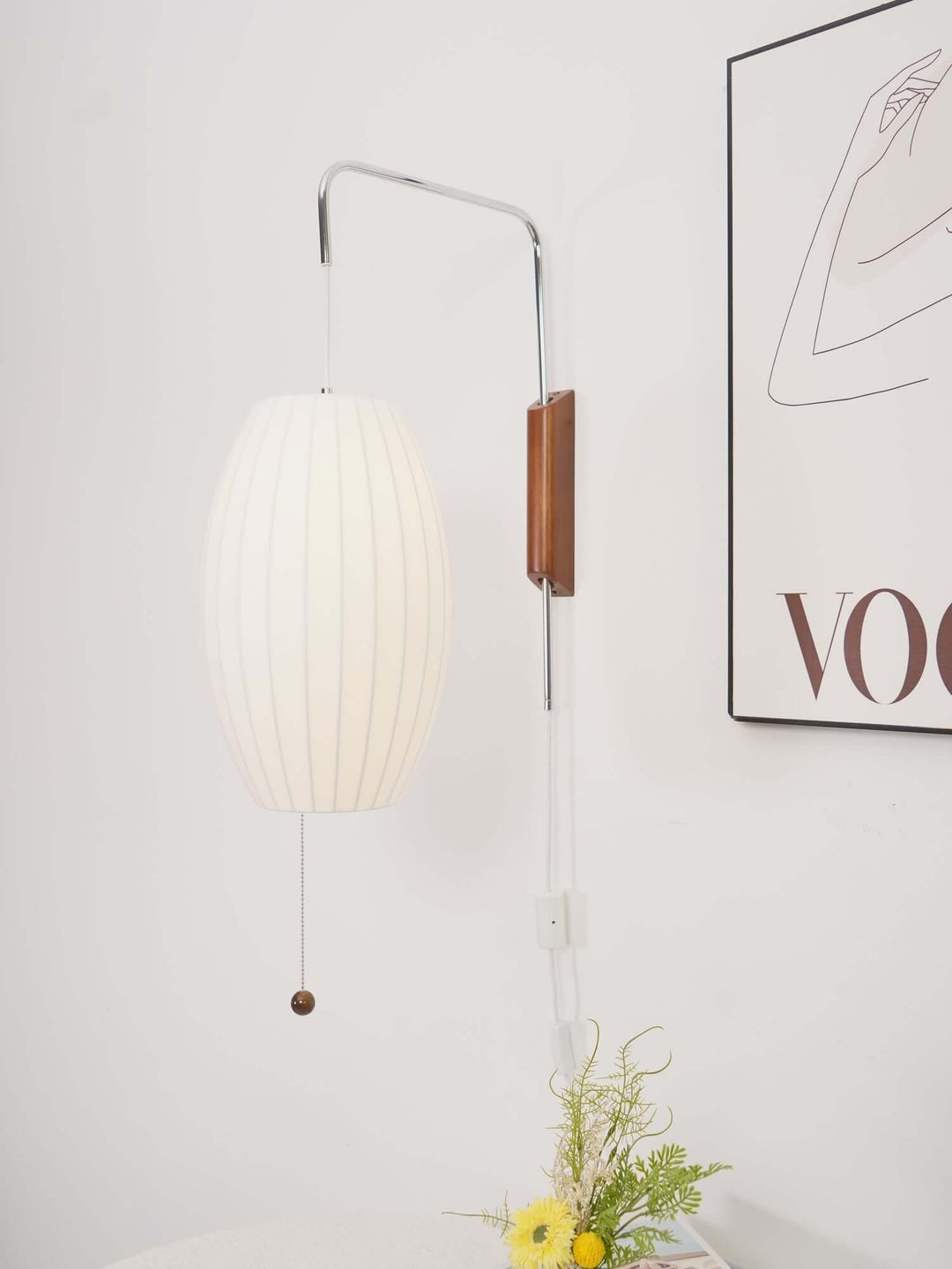 Moderne væglampe med kugledesign og varmt hvidt lys