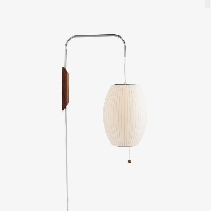 Moderne væglampe med kugledesign og varmt hvidt lys