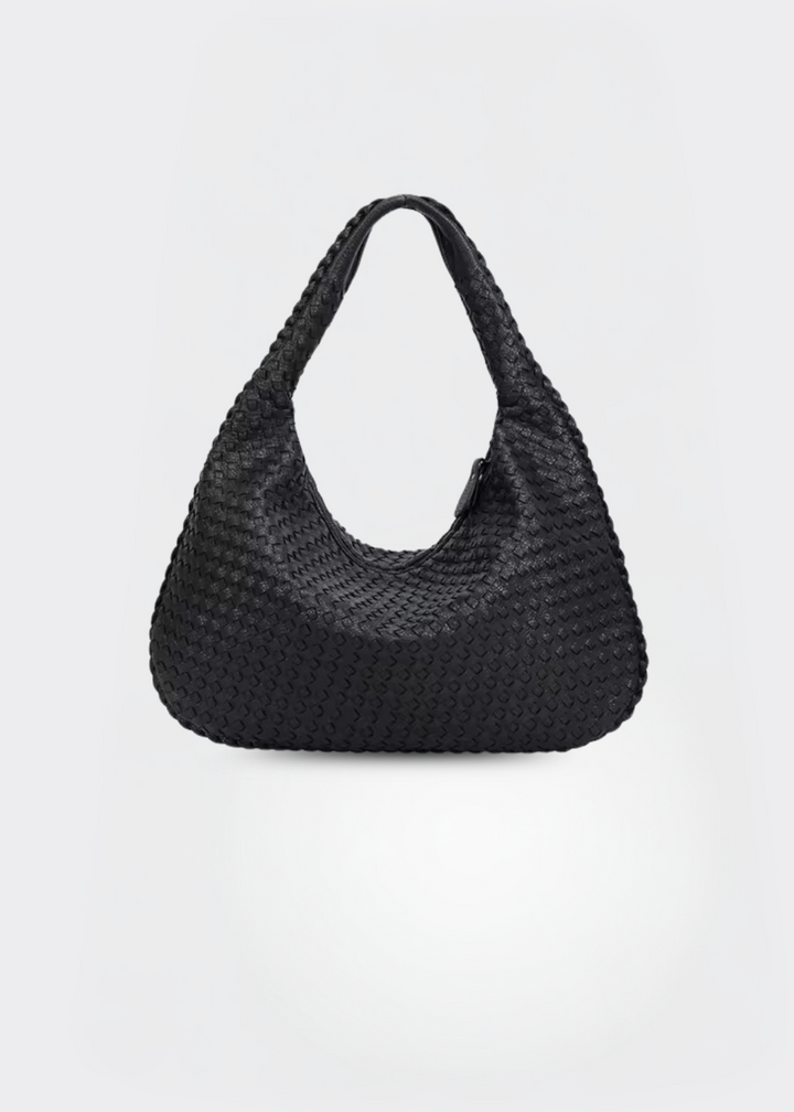 Fashionabel vegansk læder skuldertaske til kvinder. Elegant design for både hverdag og professionelt brug.