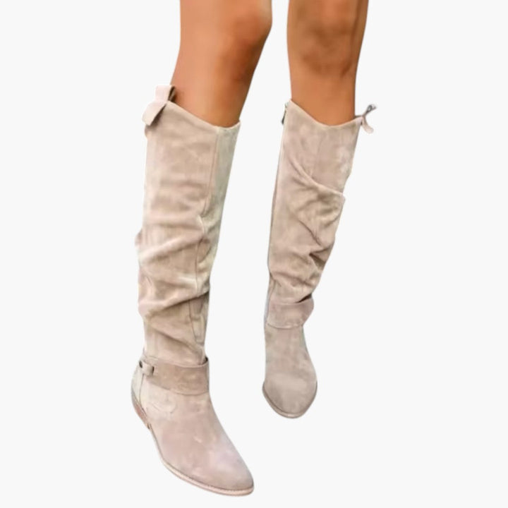 Elegante beige kvinders støvler med høj skaft, lynlås og komfortabel blokhæl. Perfekt til modebevidste.