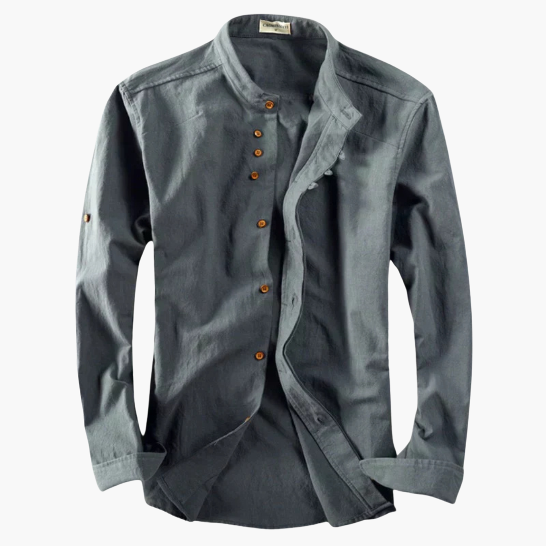 Langærmet herreskjorte med stilfuld asymmetrisk knapstolpe. Perfekt pasform og moderne look til herremode.